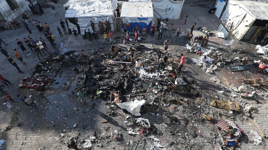 British man pictured at burned Gaza school faces war crimes probe