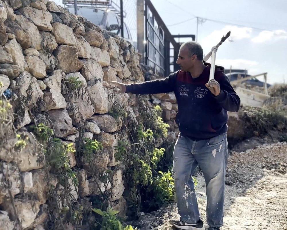 In Surif, stone walls mark generations of work on the land
